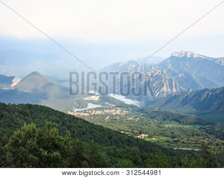 Panoramic View Of The Pre-pyrenean Area Of Catalonia, With The Sierra Cadí, Llosa Del Cavall Pond An