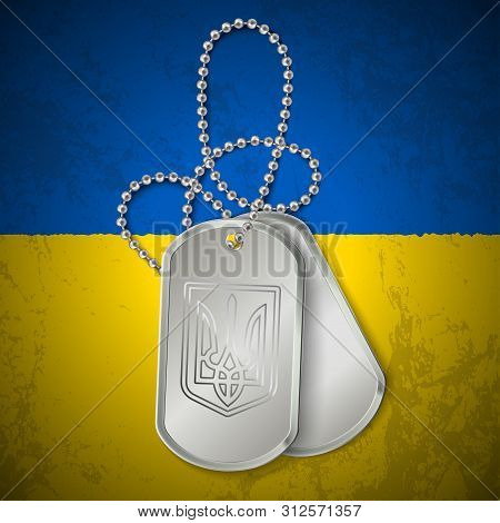Military Dog Tag With National Symbols Of Ukraine On Dirty Flag. Ukraine Conflict.