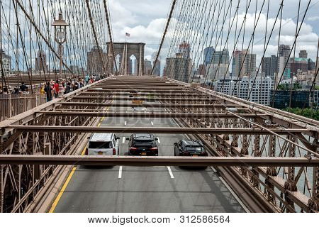 New York, Usa - June 21, 2019:  Road Traffic Over Brooklyn Bridge.