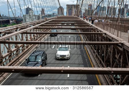 New York, Usa - June 21, 2019:  Road Traffic Over Brooklyn Bridge.