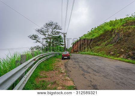 Vehicles Moving Towards The Hills Station Area At Vagamon