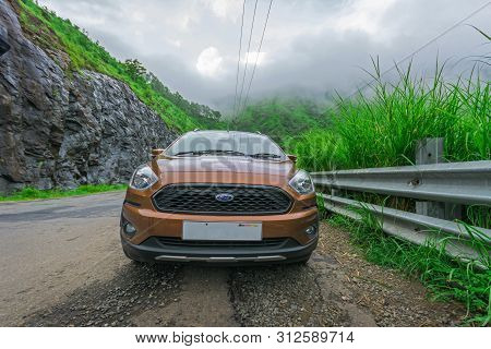 Vehicles Moving Towards The Hills Station Area At Vagamon