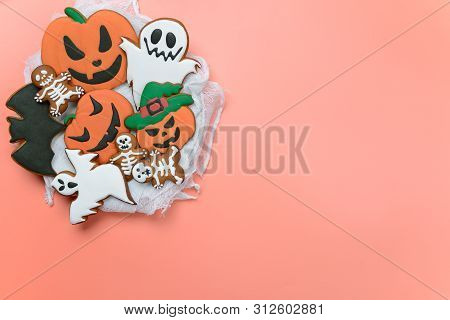 The Hand-made Eatable Gingerbread Halloween Pumpkin, Ghosts, Bat And Sceletons On Pink Background