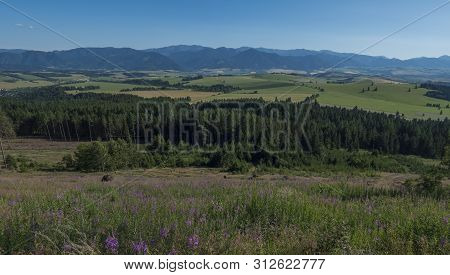 View From Tatra Mountains Trail On Baranec To Valley With Low Tatra And Blue Misty Slopes Of Hills I