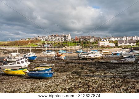 Storm Clouds Over Harbour,cemaes Bay,anglesey, Wales, United Kingdom