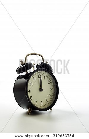 Black Alarm Clock Retro Style On White Background