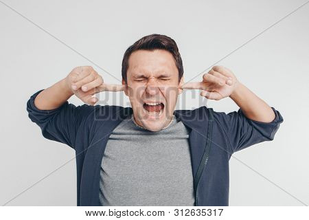 Portrait Of A Man Who Screams. Isolated On White Background. Concept Of Freedom Of Expression Of Fee