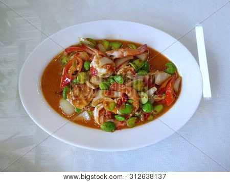 Thai Food Style, Top View Of Spicy Fried Shrimp With Stink Bean Isolated On White Background, Sataw 