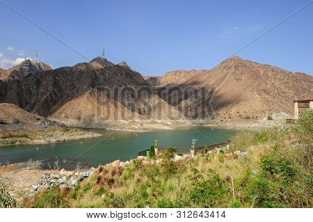 Moumtain Lake In Fujeira Emirate In Uae.nothern Emirates