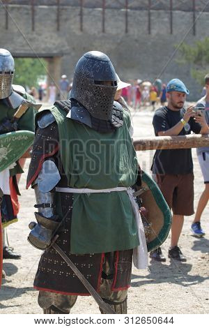 Odessa, Ukraine - July 20, 2019: Battle Of The Knights With Medieval Weapons At The Medieval Perform