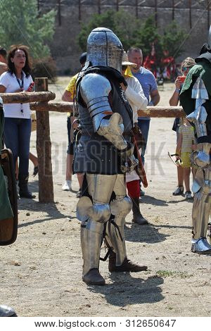 Odessa, Ukraine - July 20, 2019: Battle Of The Knights With Medieval Weapons At The Medieval Perform
