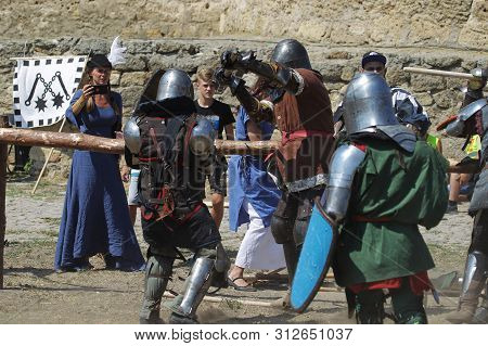Odessa, Ukraine - July 20, 2019: Battle Of The Knights With Medieval Weapons At The Medieval Perform