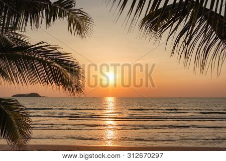 Sunset on a beautiful tropical beach on Koh Chang island in Thailand