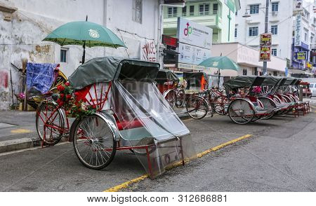Old Vintage Trishaw Or Tricycle Rickshaw And Beca
