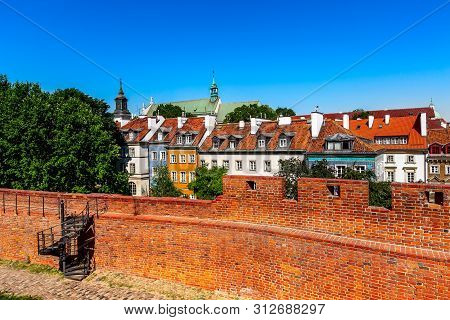 Warsaw, Poland Panoramic View Of Barbican Or Barbakan Wall And Old Town Houses