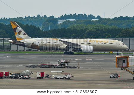 Passenger Airplane At Tokyo Narita Airport