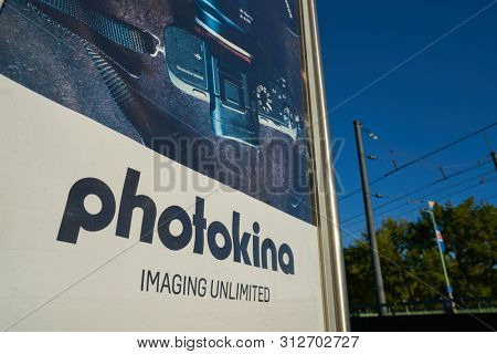 COLOGNE, GERMANY - CIRCA SEPTEMBER, 2018: close up shot of Photokina sign on advertisement poster seen in Cologne, Germany.