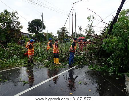 Penampang, Sabah / Malaysia - 07/22/2019: The Fallen And Crash Electric Pole After A Strong Thunders