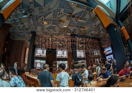 Milan, Italy - June 29, 2019: Wide Angle View Of The Interior Of The Starbucks Concept Store In Mila