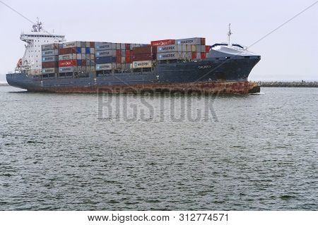 A Container Ship On The Water, A Ship Carrying Containers In Winter, 16 December 2018