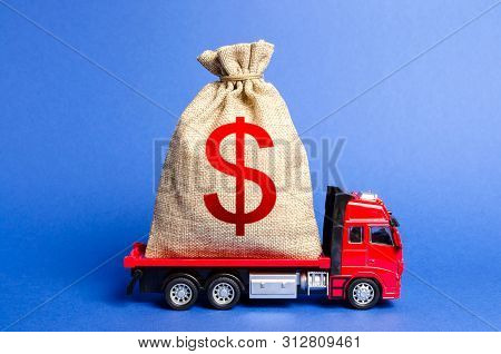 Red Truck Carries A Big Bag Of Money. Attracting Investment In Development And Modernization Of Prod
