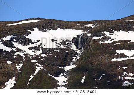Waterfall At Mount Nuolja In Northern Sweden.