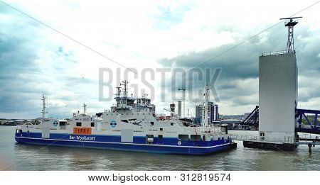 LONDON/ UK- 18th July 2019: The Ben Woolacott, is one of the new transport ferries that crosses the river Thames at Woolwich, in east London.