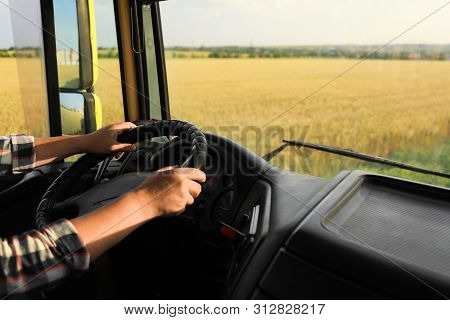 Man Driving Modern Truck On Sunny Day, Closeup