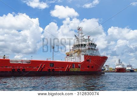 Labuan,malaysia-sept 23,2018:the Big Red Offshore Oil And Gas Supply Vessel In Labuan Island,malaysi