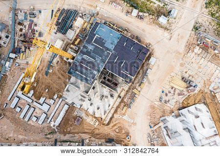 Construction Formwork In Construction Site. Aerial Topdown View Of High-rise Apartment Building Cons
