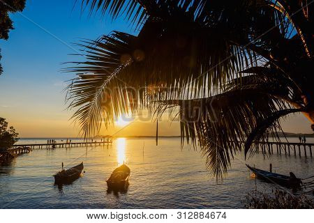 Fantasy Sunset At Beachside With Golden Sun Rays