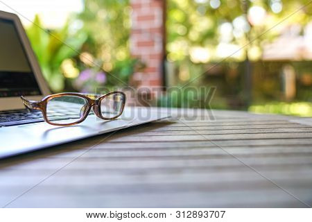 Work From Home With Garden Background. Flexi Work Concept.