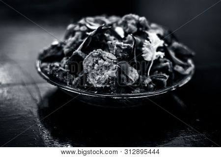 Famous Indian & Gujarati Snack Dish In A Glass Plate On Wooden Surface I.e. Patra Or Paatra Consisti