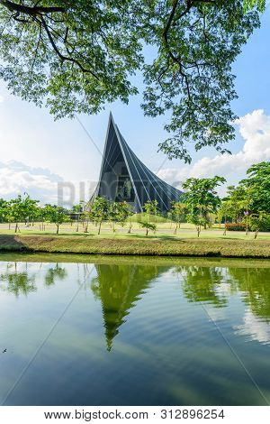 Nakhonpathom , Thailand - 18 Jul, 2019: Prince Mahidol Hall Building Of Mahidol University With Refl