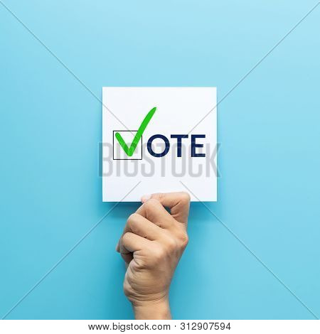 Hand Holding White Paper With The 