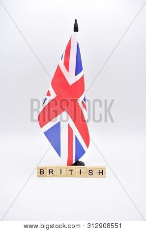 Flag Of The United Kingdom Isolated With The Word British.