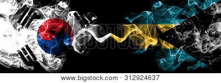 South Korea Vs Bahamas, Bahamian Smoky Mystic Flags Placed Side By Side. Thick Colored Silky Abstrac