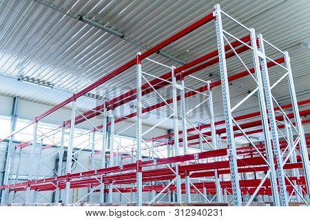 Row Of Mpty Warehouse Racks, Empty Metal Shelf In Storage Room