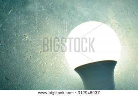Light And Electricity. Turned On Led  Lamp Close Up.