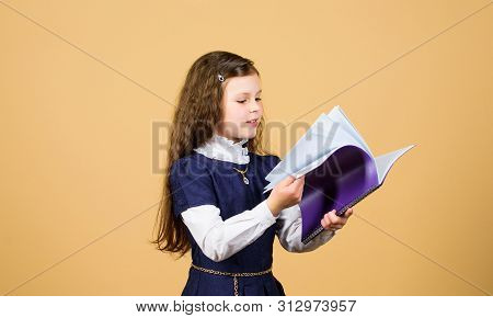 Searching For Information.knowledge And Education. Back To School. Hometwork. Serious Small Girl Wan