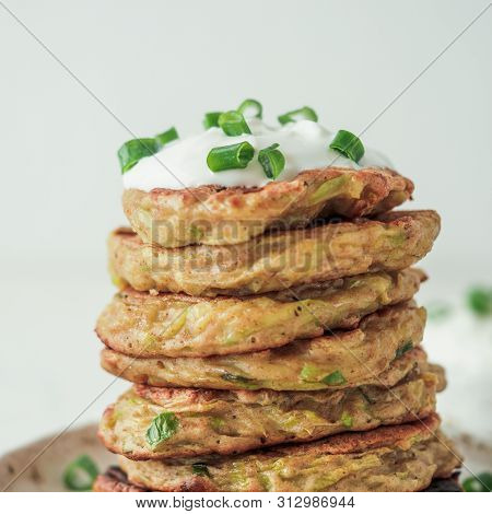 Zucchini Fritters. Gluten Free Zucchini Fritters In Stack On White Background. Vegetable Zucchini Pa