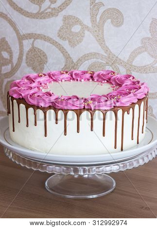 Celebratory Cake With Cream Roses And Chocolate