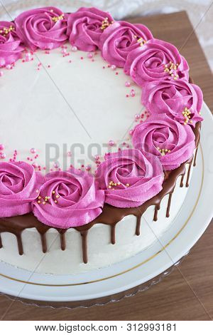 Celebratory Cake With Cream Roses And Chocolate