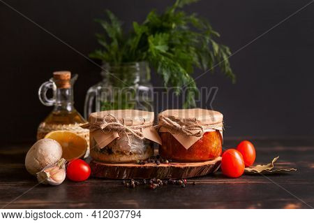Homemade Canned Fish From Mackerel In Oil And Tomato Paste. Glass Jars With Canned Fish.