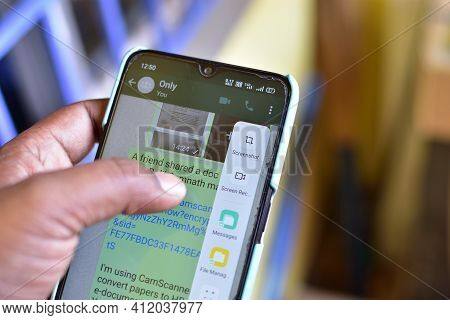 Jhargram, West Bengal, India - February 28, 2021: Taking Screenshot Of An Whatsapp Chat On A Mobile 