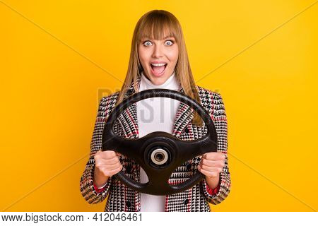Photo Of Astonished Pretty Person Arms Hold Steer Open Mouth Have Good Mood Isolated On Yellow Color