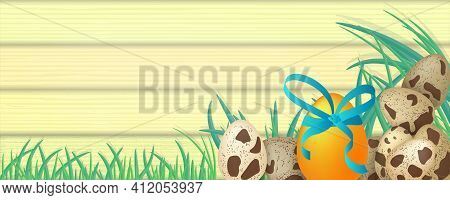 Easter Eggs On A Wooden Yellow Background With Grass. Quail And Gold Colored Egg With Decorative Bow