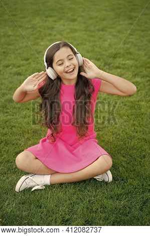 Practicing Her Singing. Happy Singer Sing Song Outdoors. Little Girl Enjoy Singing To Music. Vocal E