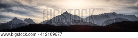 Panoramic Canadian Mountain Landscape View During A Cloudy Winter Day. Taken In Tantalus Lookout Nea