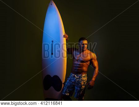 Surfboard Sexy Man. Guy With Serf Board. Summer Vacation Concept. Surfer With A Surfboard. Portrait 